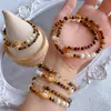 Pulsera Doble Círculo Piedra Ojo de Tigre Pulsera de Perlas de Concha de Cristal Blanco Ojo de Tigre Libro Rojo Popular Douyin Labubu Perlas de Concha