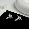 Pendientes Exquisitos de Moda Japonesa y Coreana de Gama Alta con Circonita Super Brillante Trenzados Pendientes de Diseño Versátil de Nicho de Lujo Ligero con Temperamento