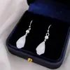 Pendientes antiguos retro de alta gama con orquídea y magnolia. Pendientes Hanfu de estilo chino con cara de caballo para mujer. Diseño elegante.