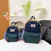 Mochila Infantil para Alumnos de Preescolar y Primaria Modelo Nuevo 2026 Mochila Sencilla Ligera de Lona para Niños de Todas las Edades