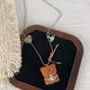 Collar Colgante de Oso Cafetero Marrón Retro para Mujer, Cadena de Suéter de Diseño de Nicho de Lujo Ligero, Cadena para Clavícula de Otoño e Invierno
