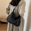 Bolso de gran capacidad para mujer, nuevo bolso cruzado de textura de nicho, bolso de hombro para estudiantes universitarios, bolso de mano para uso diario.