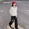 Conjunto de dos piezas versátil para niñas estilo coreano, top de cuadros patchwork con cuello para primavera y otoño con elegante ribete de encaje y pantalones casuales