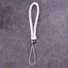 Lanyard para teléfono móvil al por mayor de fábrica, cordón para llavero de cámara de cuero PU, cuerda de muñeca para teléfono móvil de pareja, cuerda tejida de cuero