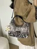 Bolso de mano de felpa versátil de gran capacidad, nuevo para el otoño de 2026, bolso de hombro y bolso cruzado de moda estilo coreano