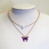 Conjunto de pendientes y collar de moda transfronteriza europea y americana, nuevo diseño de verano, con doble perla, aceite y mariposa, colgante para mujer.