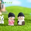 Joias de micro paisagem de musgo roupas de inverno avô avó e filho boneca velha combinação montagem DIY ornamentos