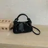 Bolso de mujer diseño de moda nicho 2026 versátil plisado bandolera bolso de mano para ir al trabajo retro nuevo estilo diagonal un solo hombro nube