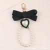 Nuevo amor lazo llavero colgante para coche pequeño fresco corazón de melocotón perla accesorios decoración de bolsa estuche para audífonos