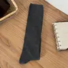 Calcetines altos para mujer estilo miu color liso versátiles calcetines largos otoño nuevo estilo estilo coreano simples ajustados calcetines jk sin costuras