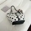 Bolsas de Moda Verão 2026 Design de Nicho Bolsa de Ombro Casual Textura Simples Elegante Bolsa de Axila Feminina