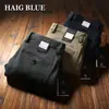 Estación europea otoño e invierno algodón grueso elástico lavado pantalones para hombre cintura media rectos holgados pantalones casuales de negocios para hombre