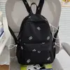 Fufu de leche estampado oscuro oso suave lindo mochila pequeña estilo japonés coreano niña viaje picnic dulce mochila que reduce la edad