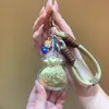 Shuibei Oro Oro Puro 999 Oro Bolsa de la Suerte Cadena para Teléfono Móvil Bolso Colgante Llavero Exquisito Regalo Regalo Venta al por Mayor
