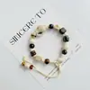 Pulsera de Cerámica Jingdezhen Nueva Historieta China Pulsera Boutique Venta al por Mayor Estudiante Joker Explosiones Puesto del Mercado Nocturno Pulsera
