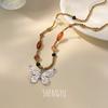 Collar con colgante de mariposa con cuentas estilo chino retro, nuevo, elegante y a la moda, combina con todo, cadena distintiva para clavícula femenina.