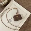 ¡¡¡Súper lindo!!! Collar Colgante Perro Globo M&M Rojo para Mujer, Nuevo Accesorio de Cadena para Suéter de Alta Gama Otoño e Invierno 2025