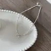Collar con lazo de plata roto y perlas de agua dulce de grano de arroz, cadena de clavícula de perlas de agua dulce barrocas, temperamento cibernético, cadena de cuello roja para mujer