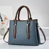 Bolso de nuevo estilo, simple y elegante, moderno y versátil, bolso de mujer para un hombro o cruzado, gran capacidad, versión coreana, bolso casual de moda
