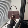 Bolso pequeño moderno y sencillo para mujer, nuevo bolso de hombro de moda para el verano 2026, bolso cruzado cuadrado pequeño elegante y casual
