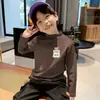 Ropa interior básica de felpa cepillada para niños Otoño e Invierno 2026 Nuevo Estilo Camiseta Infantil para Niño Pequeño de Cuello Semi-Alto con Estampado de Dibujos Animados
