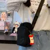 Bolsa para botella de agua de estilo japonés INS, nueva, de alta apariencia, fresca y dulce, color caramelo, para mujer, ligera para ir de compras y viajar, bolso cruzado