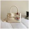 Bolso de Mano de Moda Nueva con Patrón de Lichi para Mujer, Bolso Cubo de Nicho Estilo Coreano, Bolso Versátil de Hombro y Cruzado