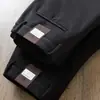 Pantalones casuales de negocios rectos para hombre, nuevos de otoño e invierno 2024, cálidos, suaves, de sarga, cintura elástica, resistentes a las arrugas, estación europea
