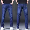Jeans Masculino Novo de Outono Preço Especial Reto Largo Elástico Casual Slim Tendência Marca Estilo para Todas as Estações