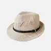 Sombrero de paja de verano transfronterizo tejido hueco sombrero jazz retro para hombres y mujeres sombrero de sol transpirable de playa británico sombrero de vaquero