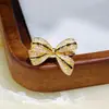 Novo Anel Vintage Esmaltado Laço de Fita para Mulheres Versátil Nicho High-End Anel de Dedo Indicador Borboleta
