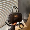 Bolso de Mano de Moda para Mujer 2026 Nuevo Estilo Coreano Bolso Boston Sencillo Versátil Bolso Cruzado tipo Almohada Moderno