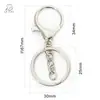 En stock Set de tres piezas con cierre de mosquetón bañado en rodio con anilla en O Cadena de cuatro secciones Anillo plano Joyería Figuras Bolsas Llaveros Colgantes
