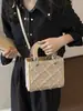 Bolsa Saco Plissada Rombos Retro Simples de Luxo High-End Transfronteiriça Feminina Nova Primavera 2026 Bolsa de Mão