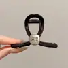 Elegante pinza de garra floral para peinado semi-recogido, nuevo modelo 2026 para mujer, pinza de tiburón de tamaño mediano para la parte trasera de la cabeza, accesorio para el cabello