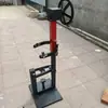 Herramienta de extracción de resorte de amortiguador Desmontaje de compresor Máquina de desmontaje Amortiguador Compresor Hidráulico Mecánico Coche