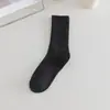 Calcetines blancos de felpa para mujer, calcetines de media pantorrilla, otoño e invierno, estilo ins moderno, combinan con todo, color liso, calcetines deportivos, medias, calcetines Zhuji al por mayor