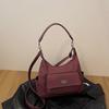 Bolsa de Ombro Casual Transfronteiriça para Mulheres 2026 Novo Estilo Coreano Tendência Retrô com Toque de Luxo e Design Versátil
