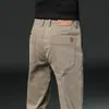 Pantalones casuales para hombre de marca francesa de alta gama, color azul marino, corte recto holgado, algodón elástico, cómodos pantalones de vestir, nuevo modelo de primavera