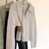 Nuevo estilo de primavera moda femenina versión coreana simple versátil top de punto de lana color liso con cuello camisero y media cremallera