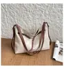 Bolso Casual de Nicho Estilo Coreano para Mujer 2026 Nueva Moda Bolso Cruzado para Viajar con Frecuencia Mochila Tote de Gran Capacidad Retro de Moda