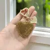 Chaveiro Criativo de Coração com Strass Pingente de Carro Criativo Coração Dourado Argola de Mola Decoração de Mochila Decoração de Bolsa