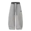 Pantalones casuales de pierna ancha bordados de estilo coreano, color liso, dobladillo curvo, venta al por mayor de una sola fuente, 55
