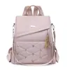 Mochila de moda transfronteriza para mujer 2026 nuevo modelo simple de nylon antirrobo elegante para viajes multiusos bolsa escolar