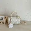 Bolso pequeño nuevo estilo chino para mujer 2026 nuevo de moda simple bolso de mano de hombro cruzado bolso almohada