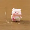 Miniatura, adorable figurita de cerdo bailando flor de cerezo, linda muñeca accesorio decorativo DIY para casa de muñecas, pieza decorativa pequeña