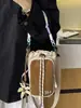 Bolsa Cruzada de Hombro Único para Deportes al Aire Libre Shuai Mi Jia 2026 Verano Nueva Moda Cordón Elegante Bolsa para Botella de Agua Bolso Elegante para Teléfono