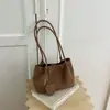 Bolso de axila tejido de alta gama para mujer, nuevo bolso de hombro de moda vintage de otoño 2026, bolso tipo cubo