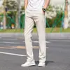 Calças Casuais Masculinas 2026 Novo Estilo Quatro Estações Business Retas Largas Cor Sólida Calças Longas Outono Calças Esportivas Masculinas