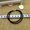 Goma elástica negra dos en uno banda para el pelo cuerda para la cabeza versión coreana de tienda de 2 yuanes puesto de Yiwu suministro accesorios para el cabello diy tocado